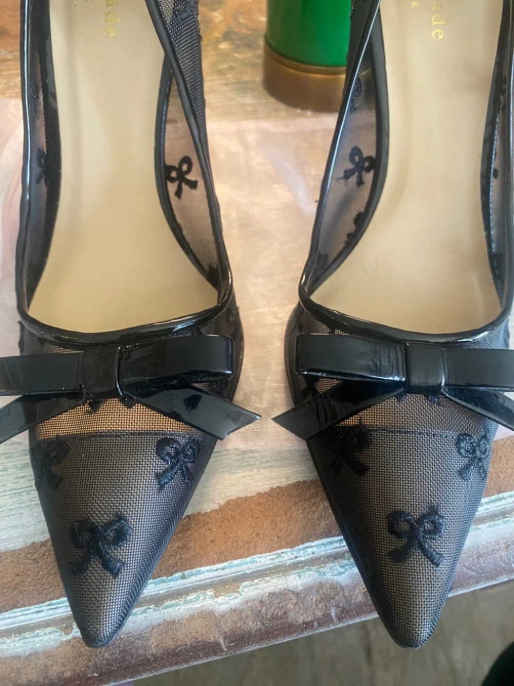 Kate Spade black mesh pump with bow motif! Beautiful, great condition 9.5